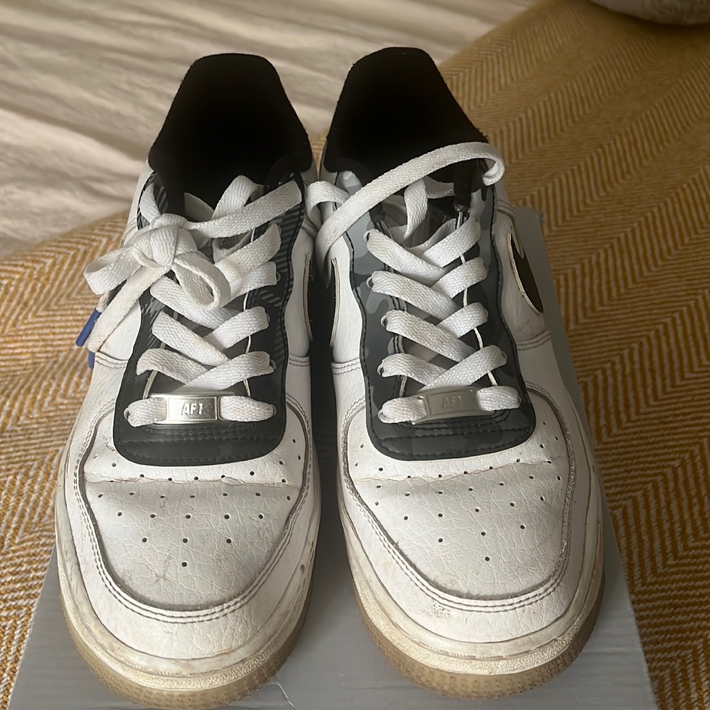 Nike Air Force. Comes with box.
